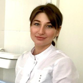 Каряева Елена Асламбековна, стоматолог-терапевт