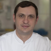 Гладков Евгений Николаевич, стоматолог-хирург