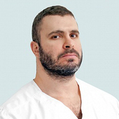 Турки Таха Мохамадович, стоматолог-хирург