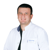 Антониадис Эмзар Шаликоевич, имплантолог