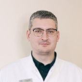 Козлов Павел Аркадьевич, стоматолог-хирург