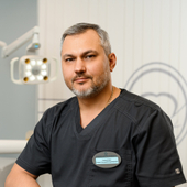 Комин Геннадий Владимирович, стоматолог-хирург
