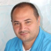 Шарипов Евгений Миндигалимович, стоматолог-хирург