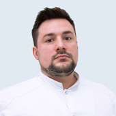 Турков Евгений Жанович, имплантолог