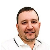 Новожилов Евгений Николаевич, стоматолог-хирург