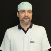 Корж Артур Иванович, стоматолог-хирург