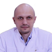 Каравай Роман Сергеевич, ортопед