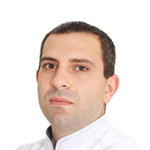 Уснунц Юрий Камович, стоматолог-хирург