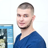 Коваль Евгений Александрович, стоматолог-хирург