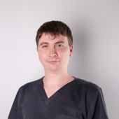 Мерк Юрий Михайлович, стоматолог-хирург