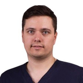 Адодин Денис Александрович, стоматолог-хирург