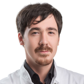 Тоинов Юрий Николаевич, стоматолог-терапевт