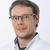 Осколков Евгений Олегович, дерматолог