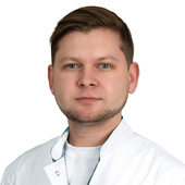 Николаев Евгений Сергеевич, стоматолог-хирург