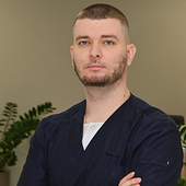 Коваль Евгений Александрович, стоматолог-хирург