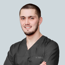 Маликов Али Маликович, стоматолог-хирург