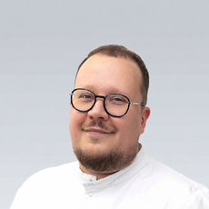 Корнилов Максим Александрович, стоматолог-хирург
