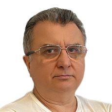 Мухсинов Юрий Джавланович, стоматолог-хирург