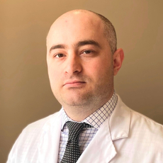 Дзкуа Лаша Мурманович, нейрохирург