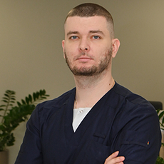 Коваль Евгений Александрович, стоматолог-хирург