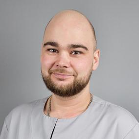 Романченко Александр Сергеевич, стоматолог-хирург