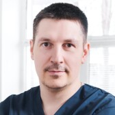 Николаев Александр Евгеньевич, стоматолог-хирург