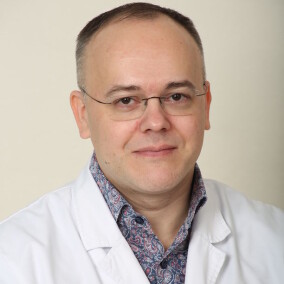 Кузьминов Александр Евгеньевич, онколог