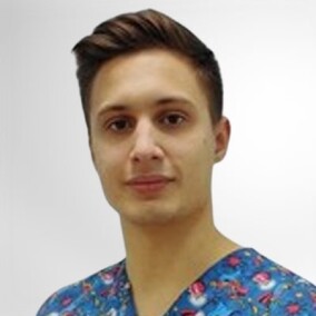 Поклад Артем Александрович, стоматолог-хирург
